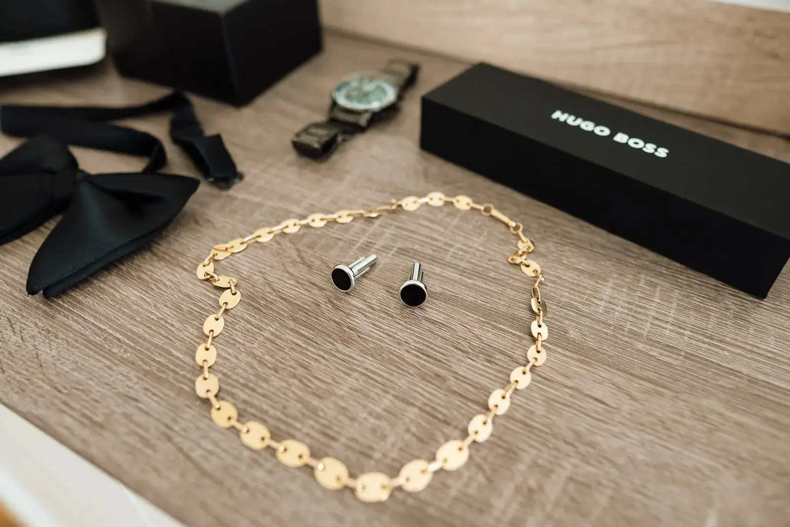 A wedding photograph in the Luxury Glow brand, an editorial frame with strong contrast